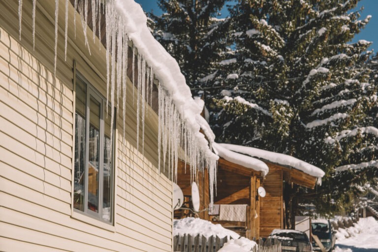 frozen house covered in snow